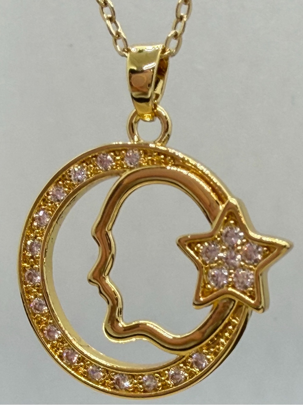 Gold Moon & Star Pendant Necklace with clear Stones